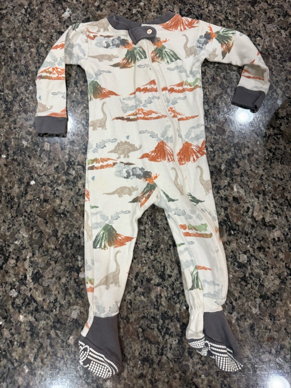 Burt's Bees Cream Footed One-Piece with Orange & Green Dinosaur Print
